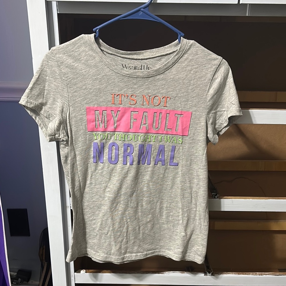 Wound Up Gray Shirt with Pink, Green, and Purple Accents
